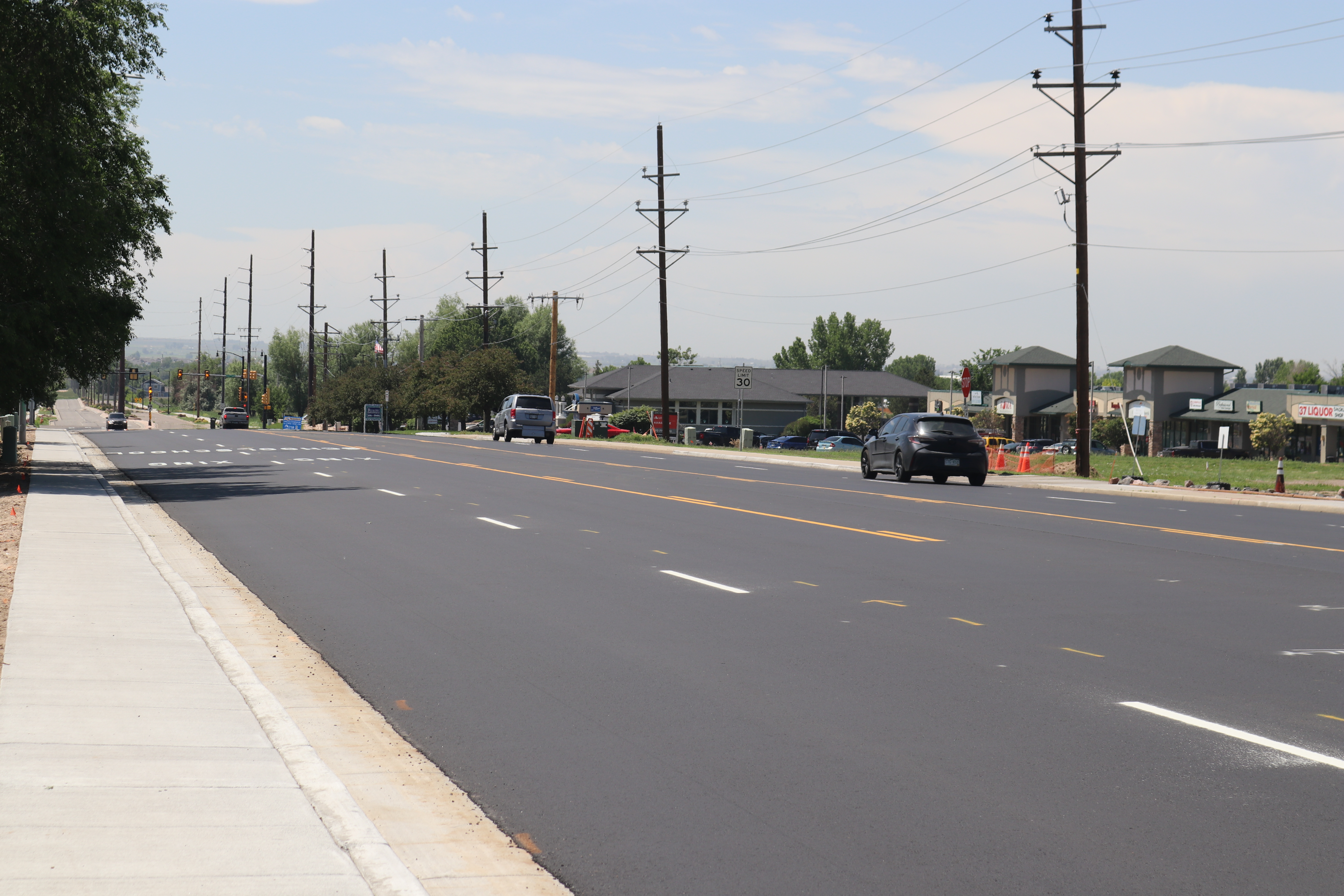 23rd Avenue looking south from 34th Street following the completion of mill & overlay work.